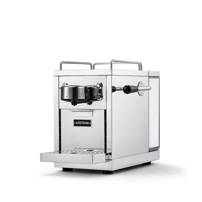 The Original espresso machine side angle showing sleek stainless steel profile and chrome finish